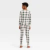 Kids' Plaid Ribbed Long Sleeve Shirt And Pants Holiday Matching Family Pajama Set - Wondershop™ Cream -Wondershop GUEST 4cba9cb6 415c 4122 849c 9e5bf3dc047f