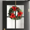 22" Mixed Greenery And Poinsettia Flowers Decorated Artificial Christmas Wreath Green - Wondershop™ -Wondershop GUEST 5ebbe8d4 60bd 459c 8278 418690d8cc4b